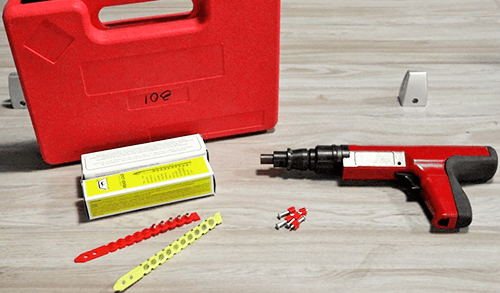 Which is a low velocity powder actuated fastening system?